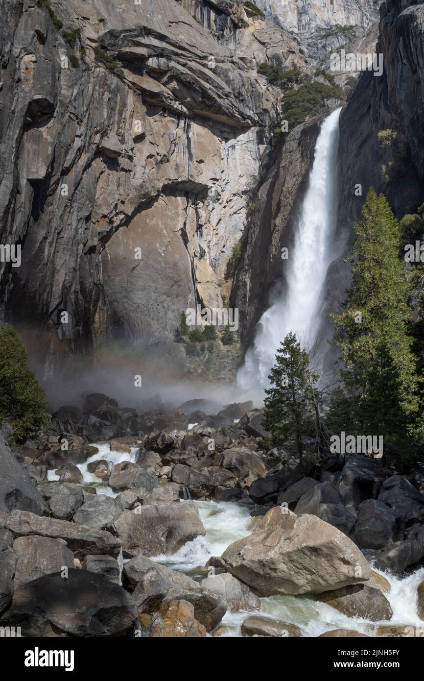Yosemite’s Bridalveil Falls from close in the Spring of 2022, California, USA, including a view of the creek Stock Photo