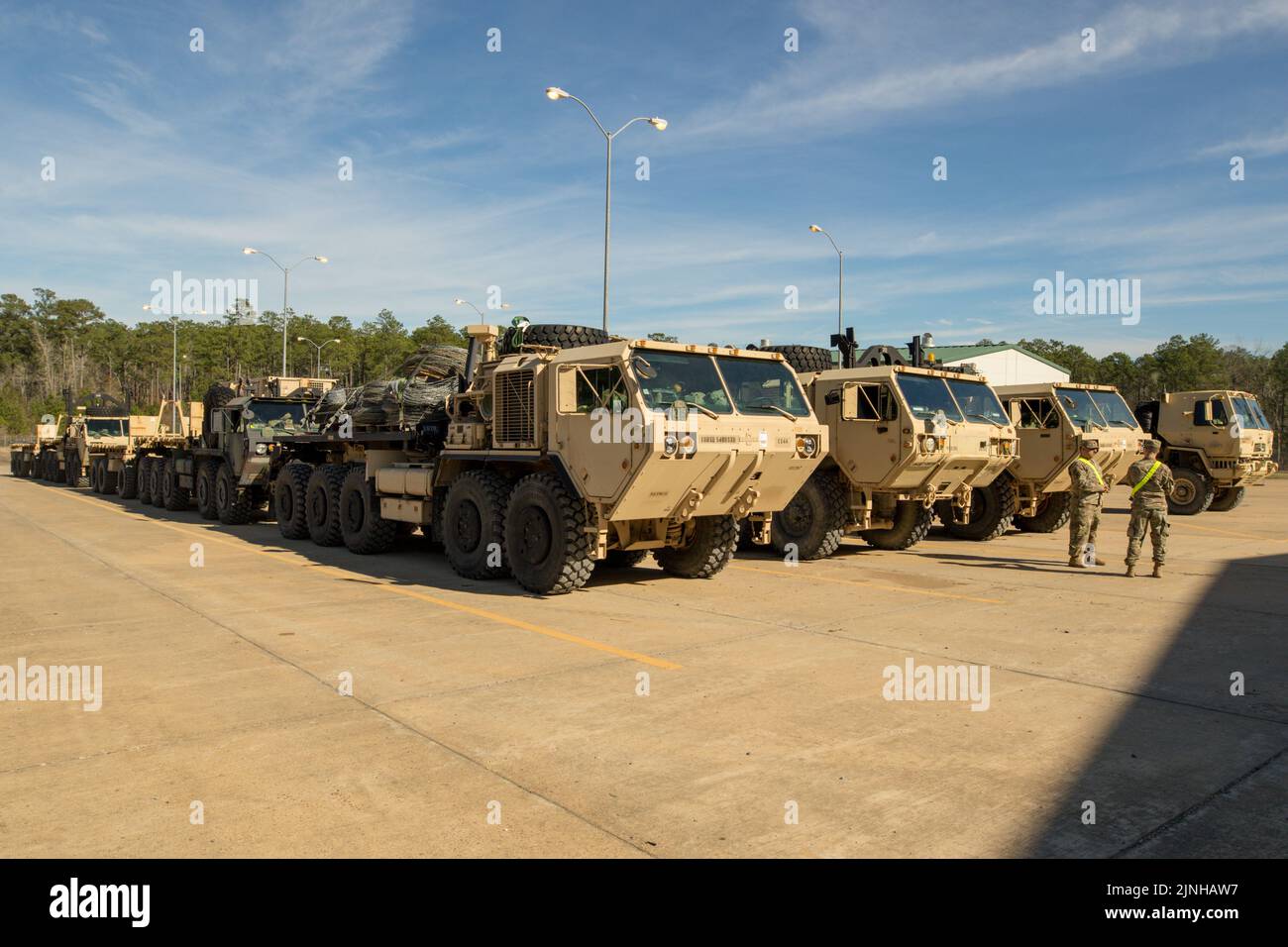 Soldiers with 1st Brigade Combat Team, 10th Mountain Division prepare M1075A1 Palletized Load Systems for the application and calibration of multiple integrated laser engagement system (MILES) equipment at the Joint Readiness Training Center on Fort Polk, La., Jan. 10, 2022. MILES uses blank cartridges and lasers to simulate battle during military training. (U.S. Army photo by Sgt. Kevin Dunnaway) Stock Photo