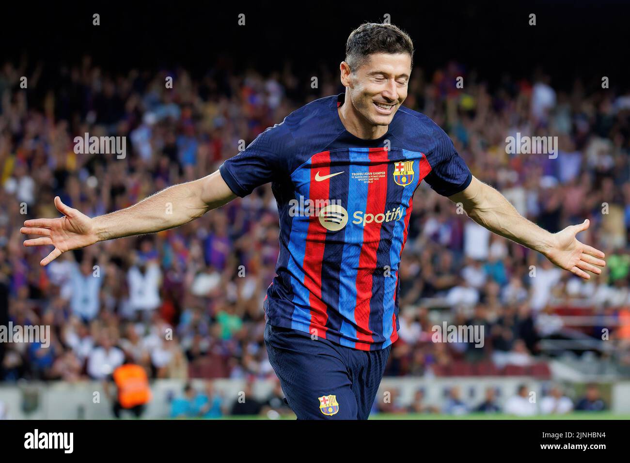 BARCELONA - AUG 7: Lewandowski celebrates after scoring a goal during the Joan Gamper Throphy match between FC Barcelona and Pumas at the Camp Nou Sta Stock Photo