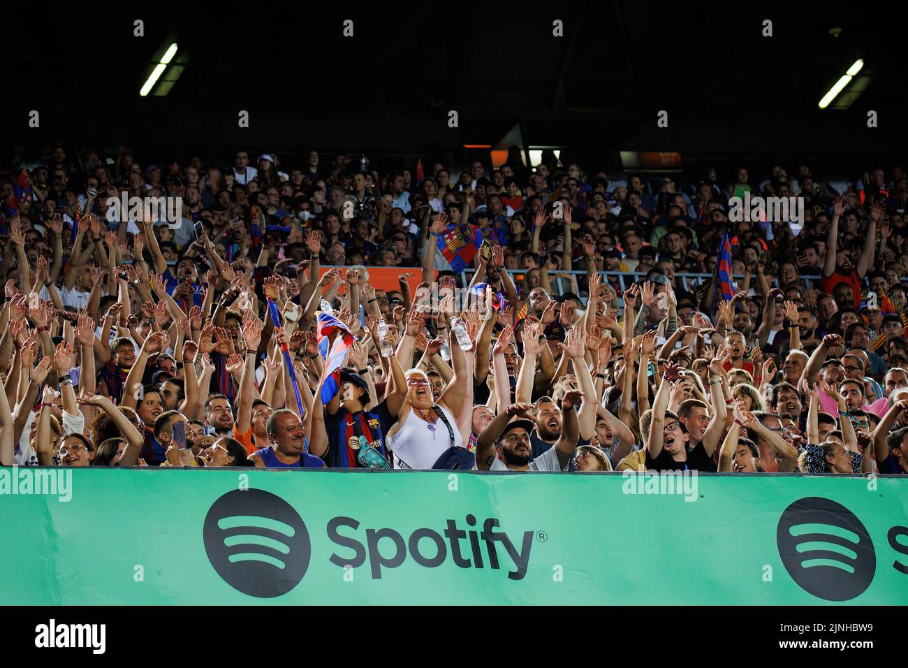 BARCELONA - AUG 7: The fans enjoy during the Joan Gamper Throphy match between FC Barcelona and Pumas at the Camp Nou Stadium on August 7, 2022 in Bar Stock Photo