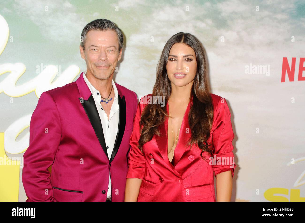 LOS ANGELES, CA - AUGUST 10: (L-R) Massi Furlan and Yolanthe Sneijder-Cabau attend the World Premiere of Netflix's 'Day Shift' at Regal LA Live on Aug Stock Photo