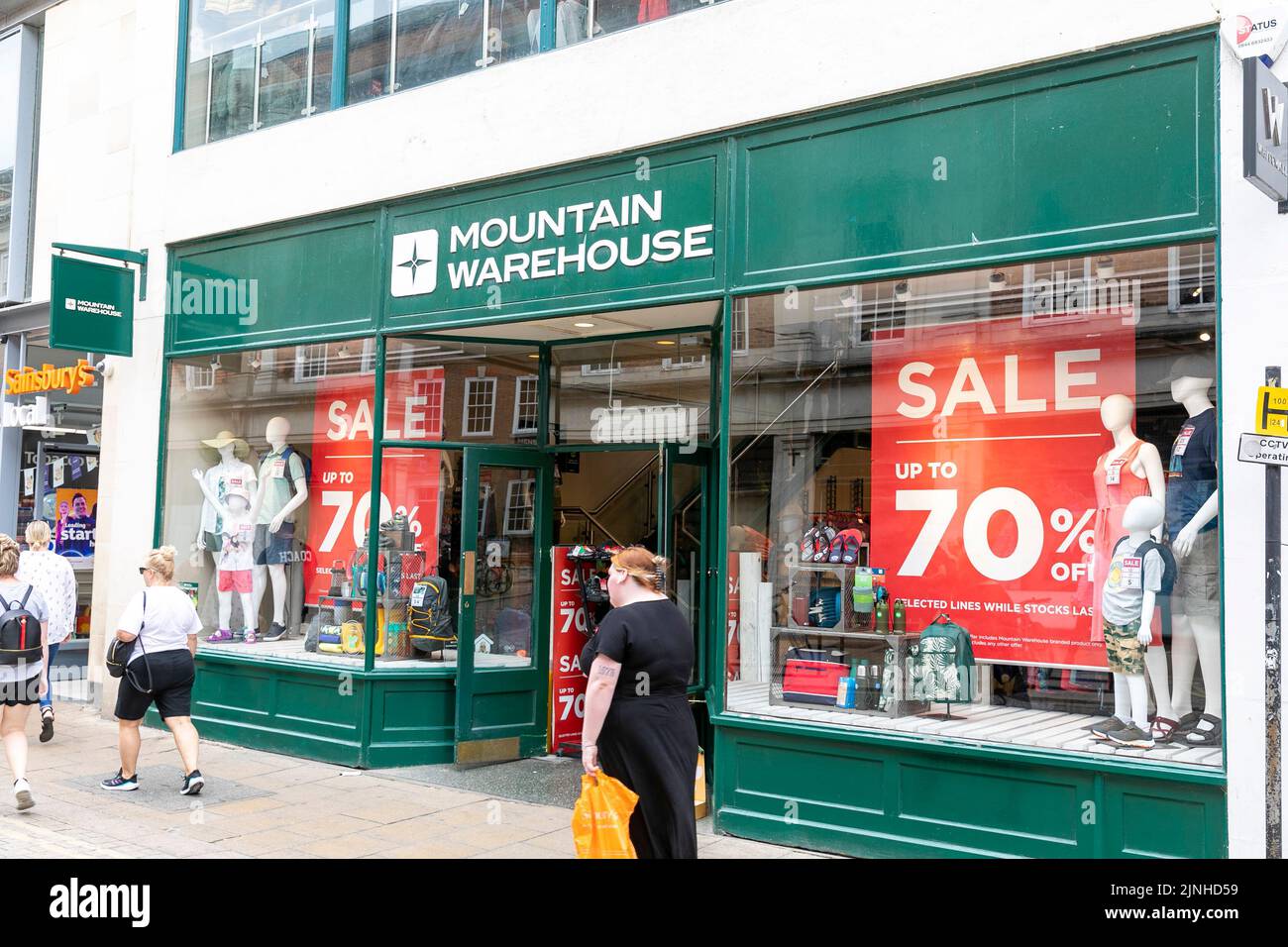 Mountain warehouse outdoor clothing store in York city centre, summer sale offers 70% off some items,Yorkshire,England,UK,july 2022 Stock Photo