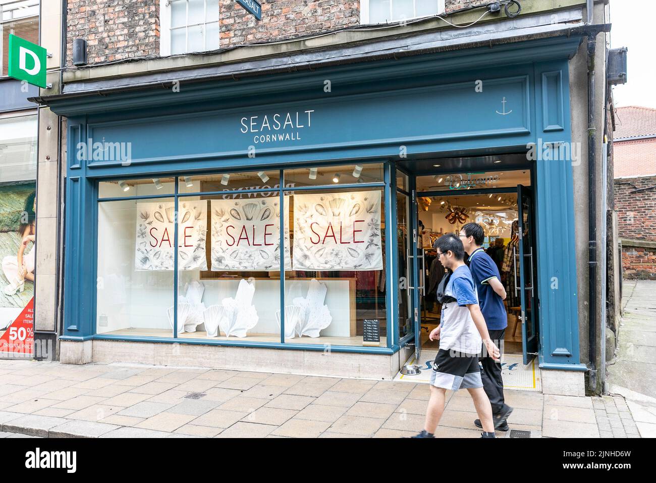 Seasalt Cornwall, store in the city of York promoting advertising summer sale on goods clothing in the shop,Yorkshire,England,July 2022 Stock Photo