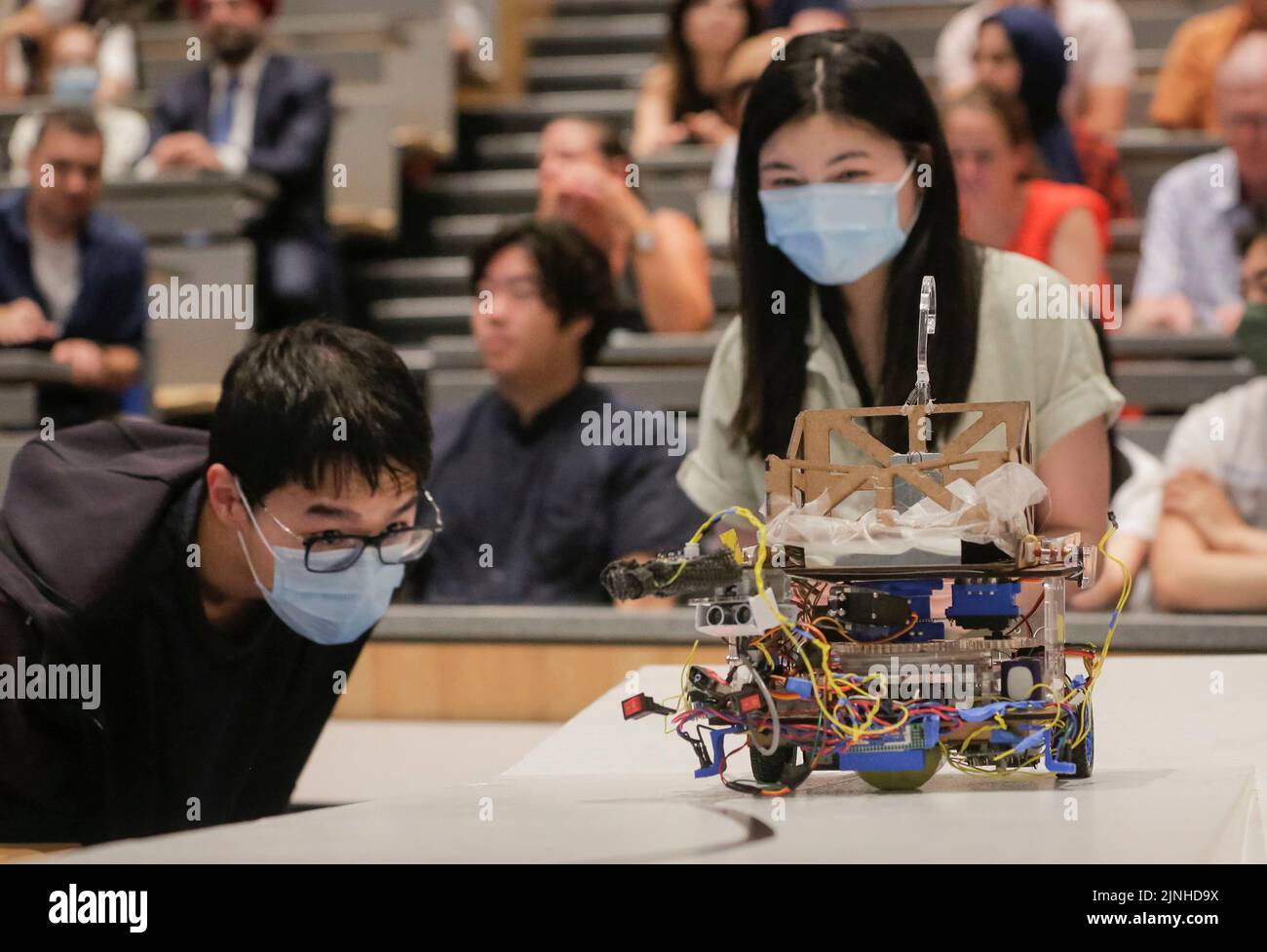 Vancouver, Canada. 11th Aug, 2022. Contestants watch their robot in