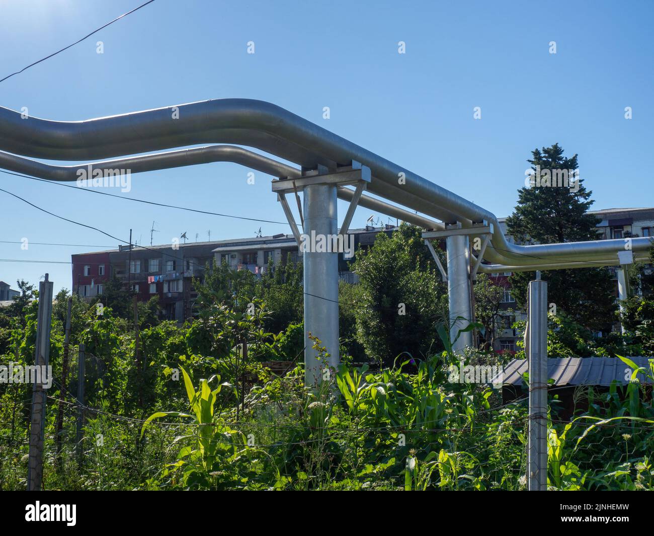 Large pipe above the ground. Gas communications. Pipes in the city