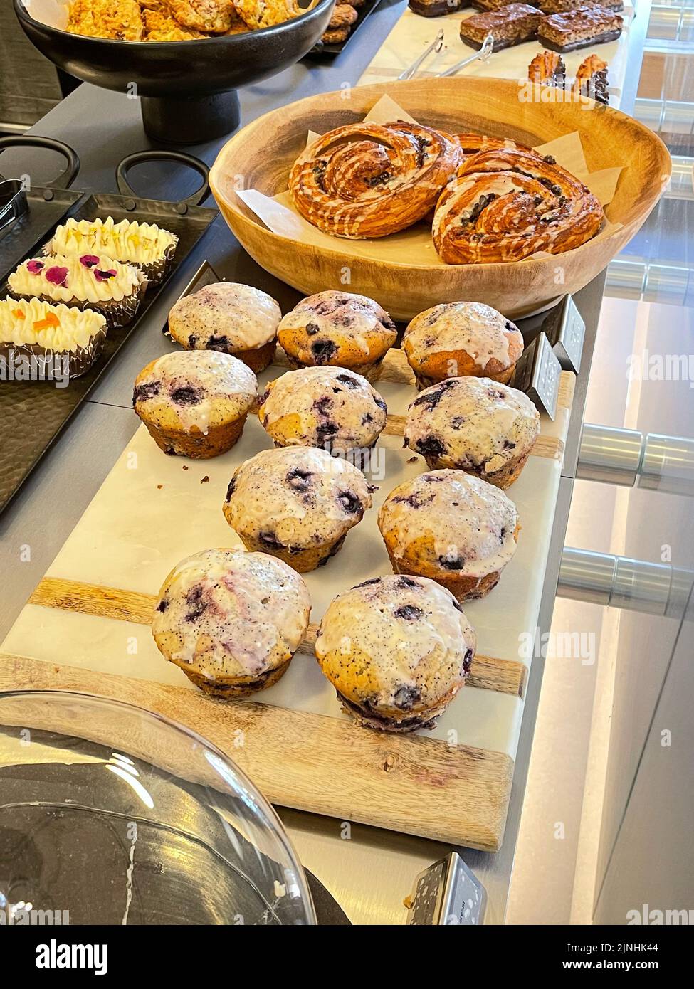 fresh assortment of bakery goods on display Stock Photo