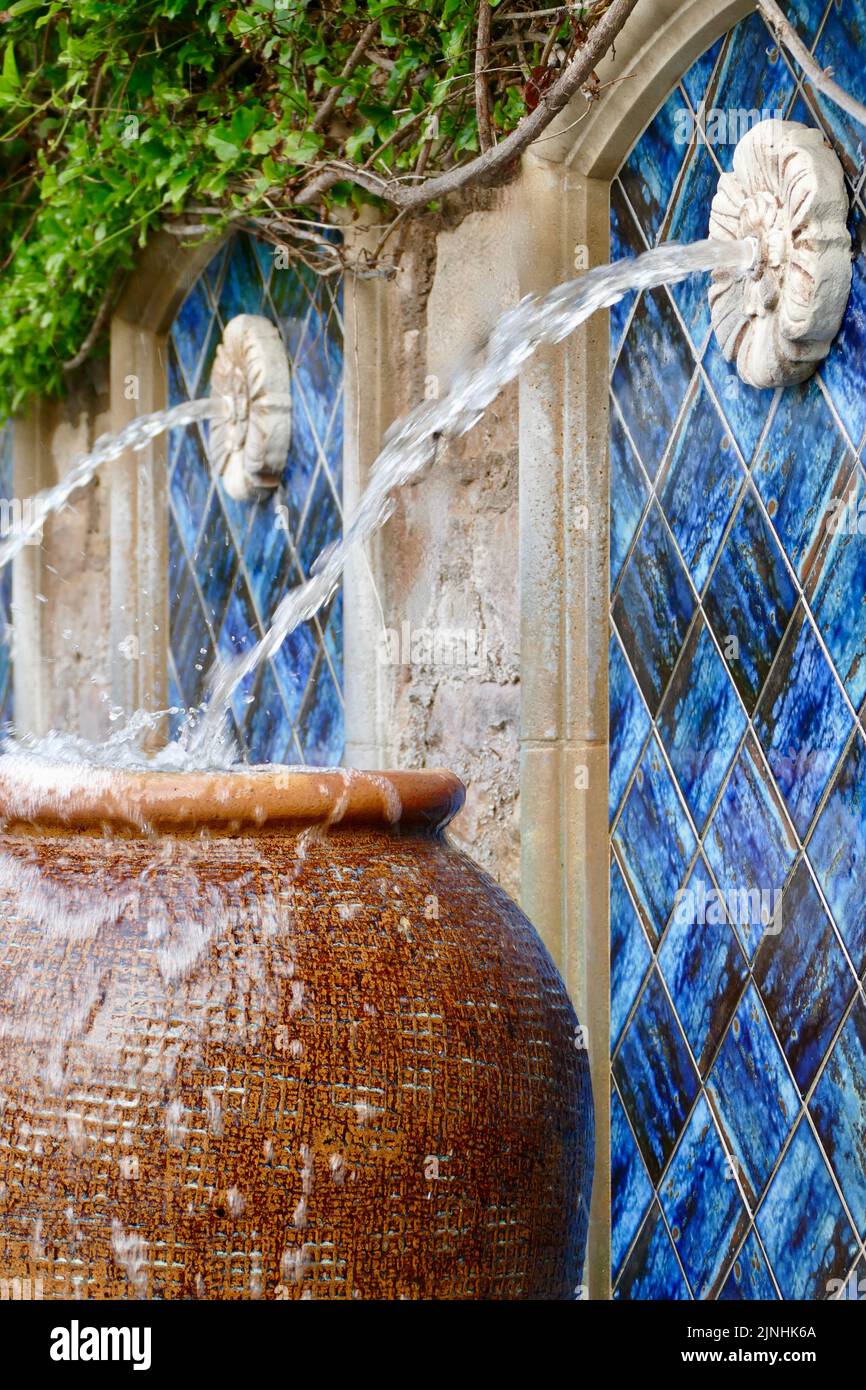 beautiful water fountain with overflowing basin Stock Photo Alamy