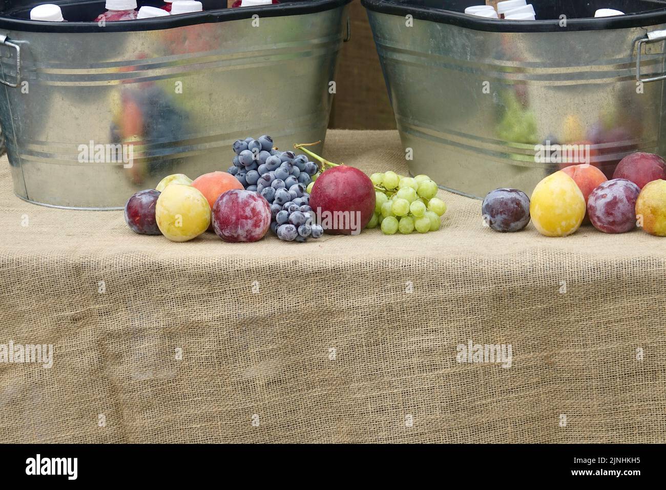assortment of fresh fruit on display at the farmers market food stall Stock Photo