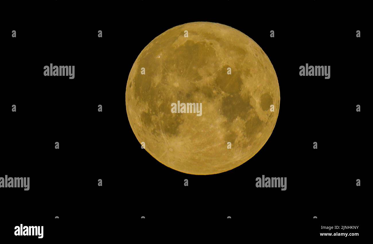 Lurgan, County Armagh, Northern Ireland, UK. 12 Aug 2022. 01.36 am (BST) August 2022 full moon in the sky over County Armagh. The August full moon, the Sturgeon Moon and in this case a supermoon given its close proximity to the earth. Credit: CAZIMB/Alamy Live News. Stock Photo