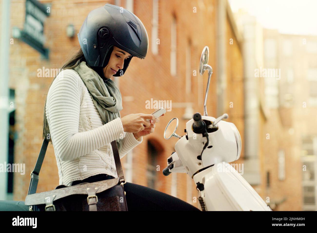Lady in scooter hires stock photography and images Alamy
