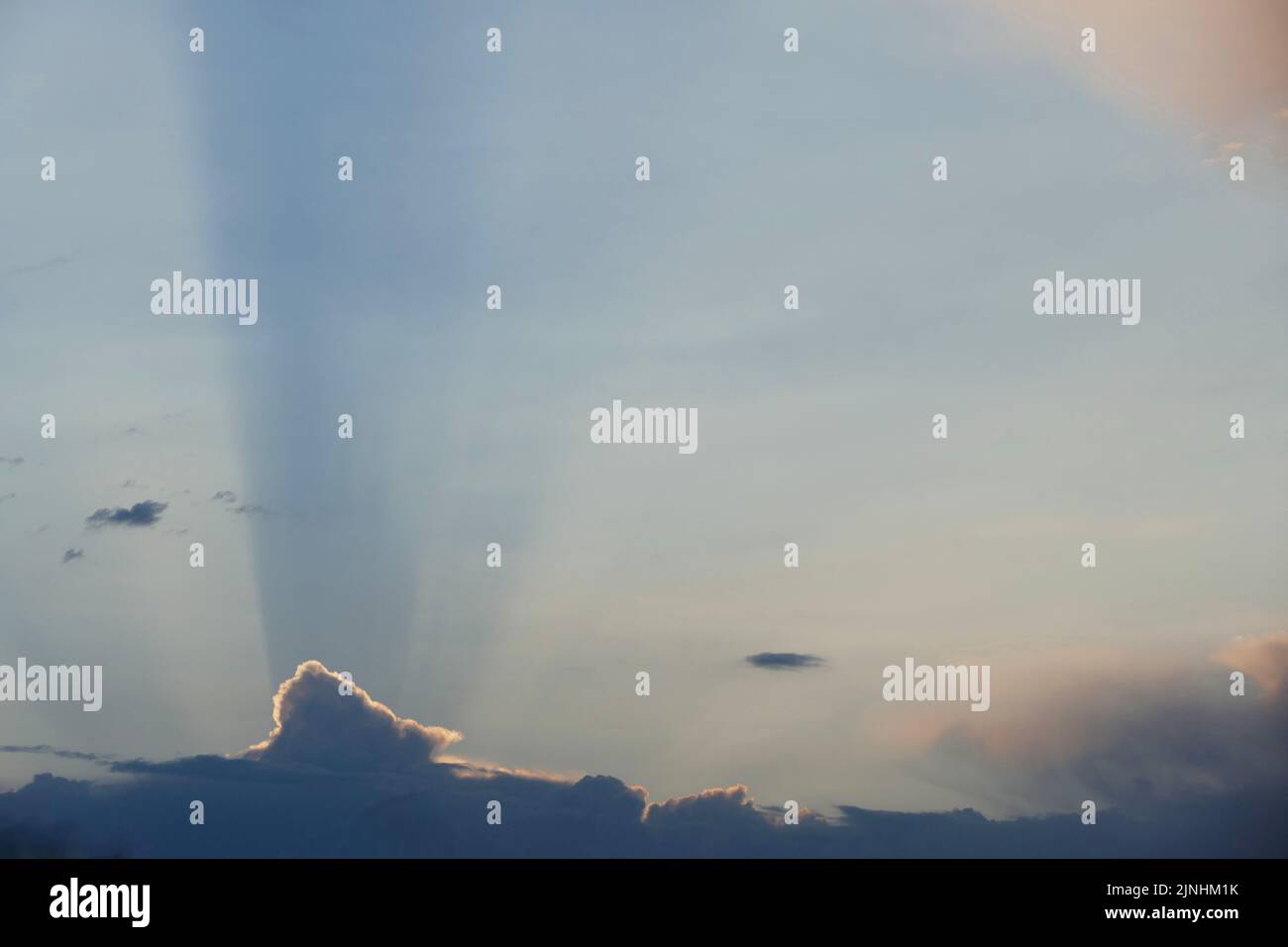 clouds on a clear day near sunset Stock Photo