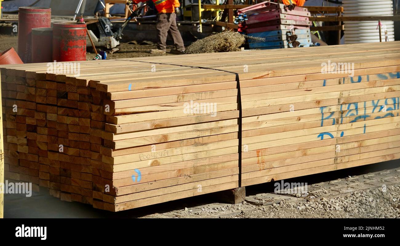 stack of lumber on the job site of new building Stock Photo Alamy