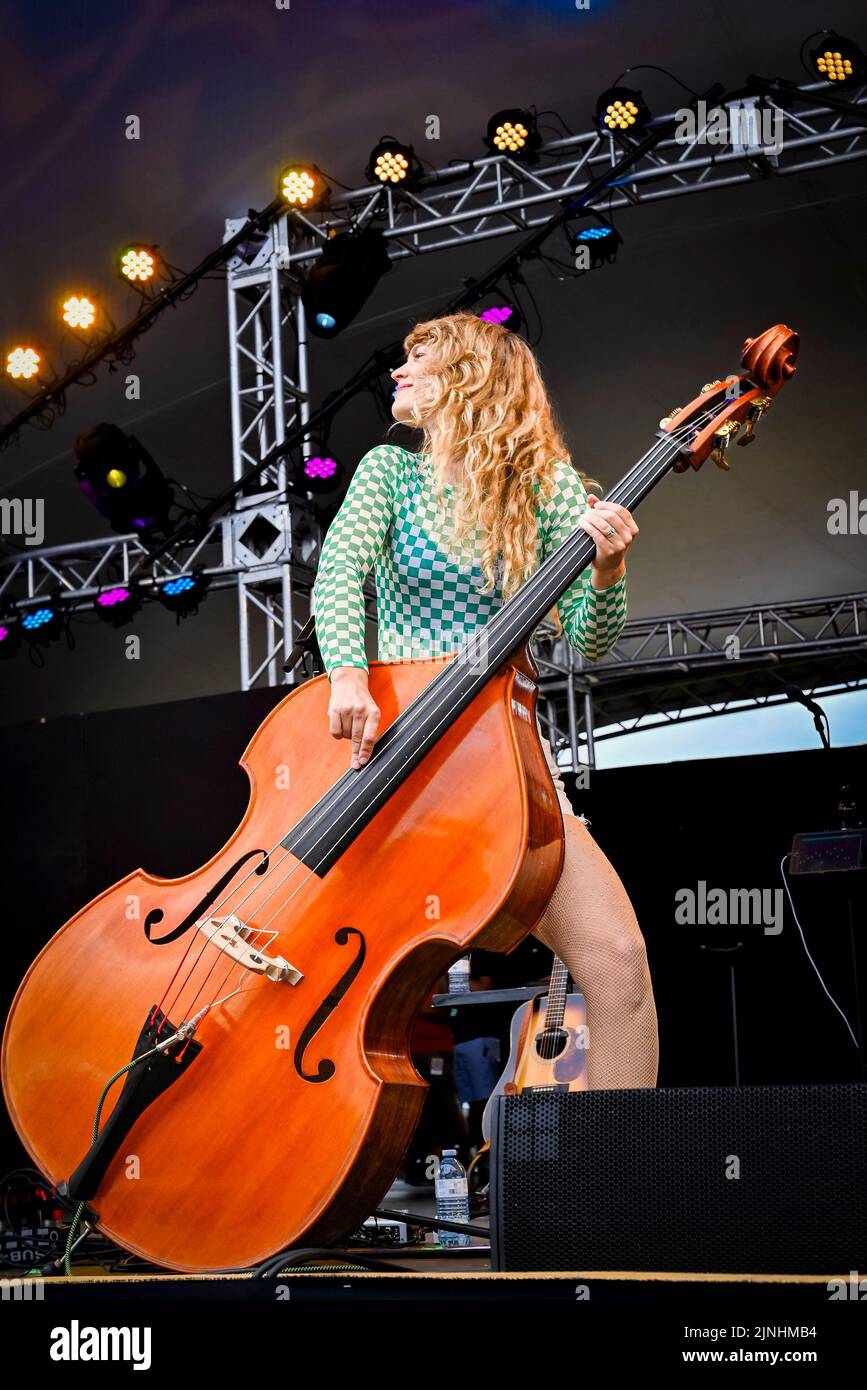 Upright bassist Shelby Means playing with Molly Tuttle & Golden Highway bluegrass band, Vancouver Folk Music Festival, Vancouver, British Columbia, Ca Stock Photo