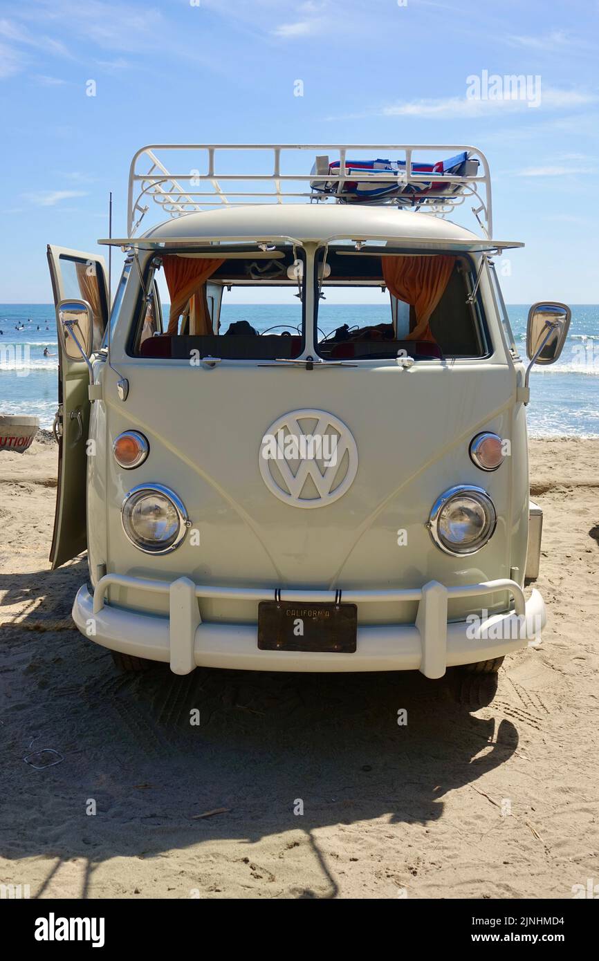looking through the windshield of a vintage VW camper at the beach Stock Photo
