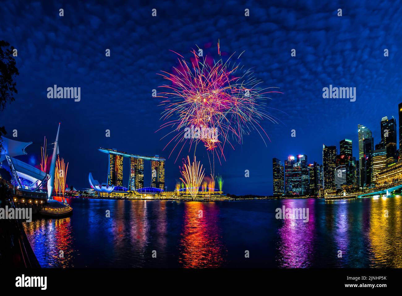 National Day Parade 2022 Rehearsal's fireworks at Marina Bay, Singapore. Stock Photo