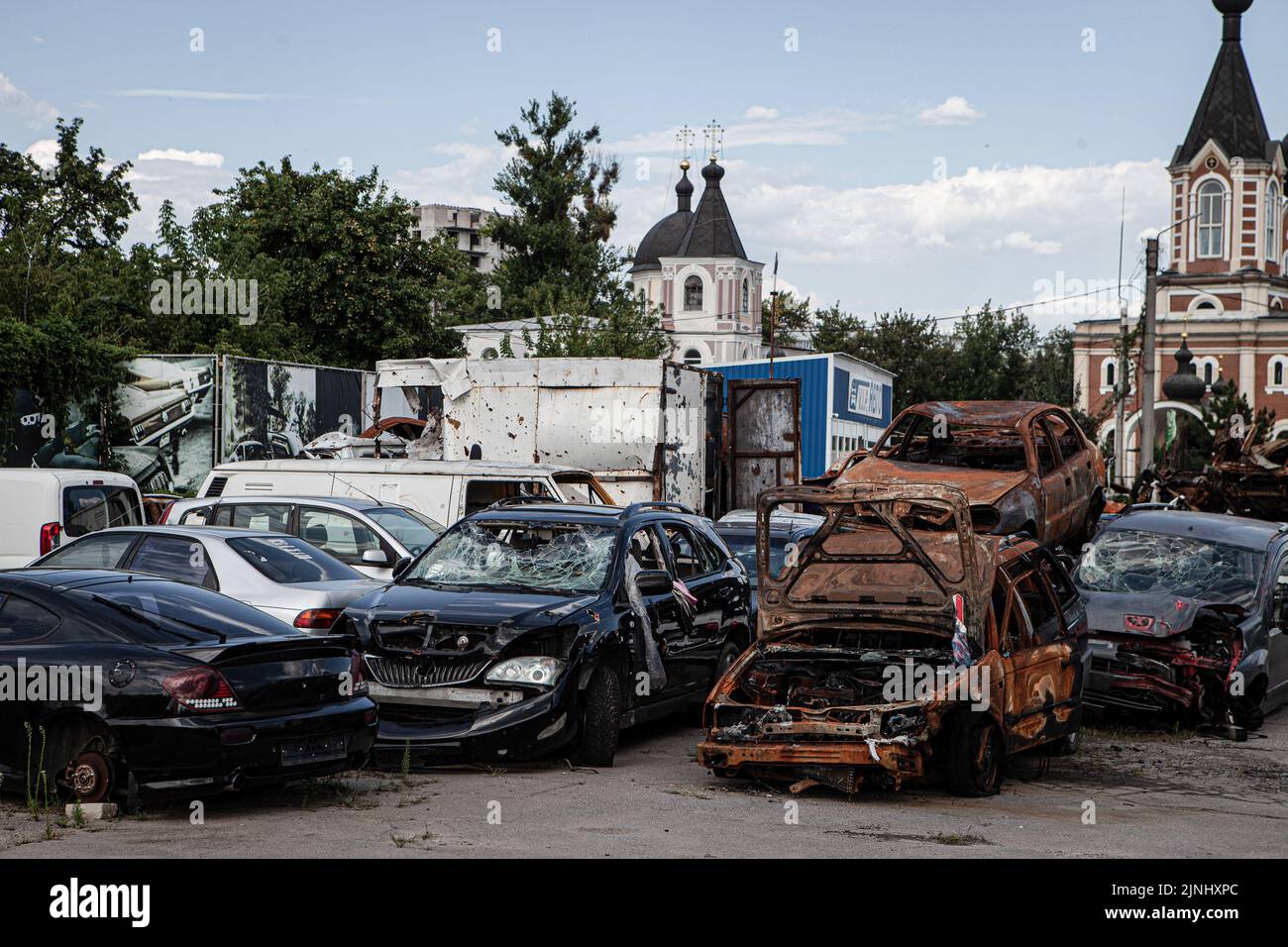 Kharkiv, Ukraine. 8th Aug, 2022. Cars damaged in a courtyard in Kharkiv. The Ukrainian city of Kharkiv, 50 kilometers from the Russian border, has endured consistent attacks since the beginning of the full-scale Russian invasion on February 24. (Credit Image: © Richard Wright/SOPA Images via ZUMA Press Wire) Stock Photo