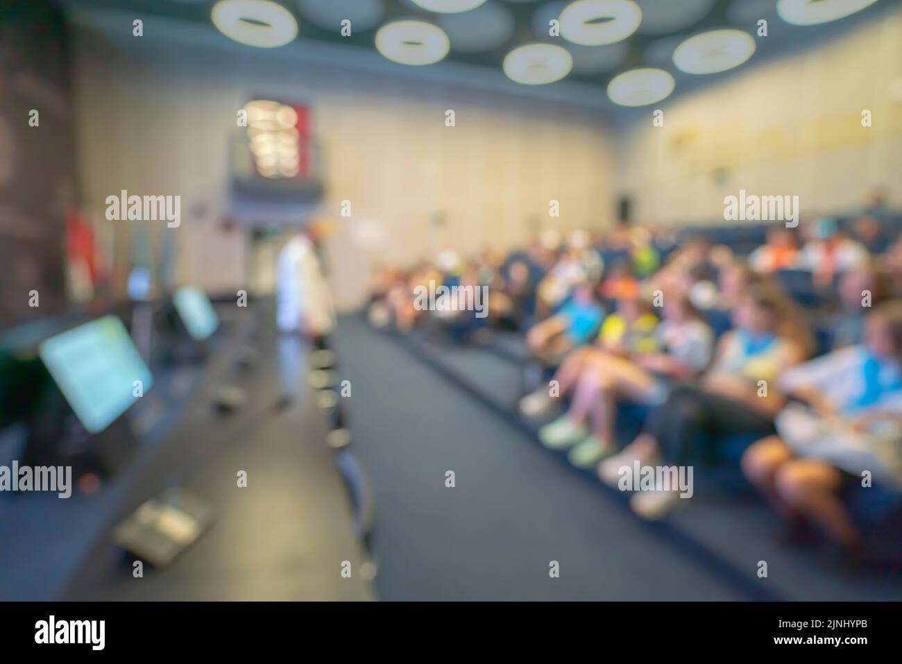 Abstract blurred people lecture in seminar room, education concept. High quality photo Stock Photo