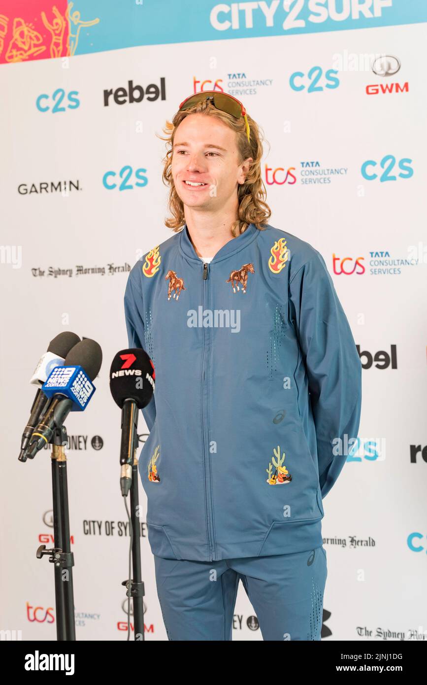 Sydney, Australia.12 August 2022: Elite distance runner and one of the race favourites, Ed Goddard, at a press conference prior to the 50th City2Surf race in Sydney on Sunday. This will be the first race since 2019 after cancellations in 2020 and 21 due to Covid-19. 60,000+ people are expected cover the fourteen-kilometre race, the largest of its kind in the world. Mr Goddard urged participants to compete but also enjoy the 14km race and to take in the view as the route follows the harbour into the Eastern Suburbs. Credit: Stephen Dwyer / Alamy Live News Stock Photo