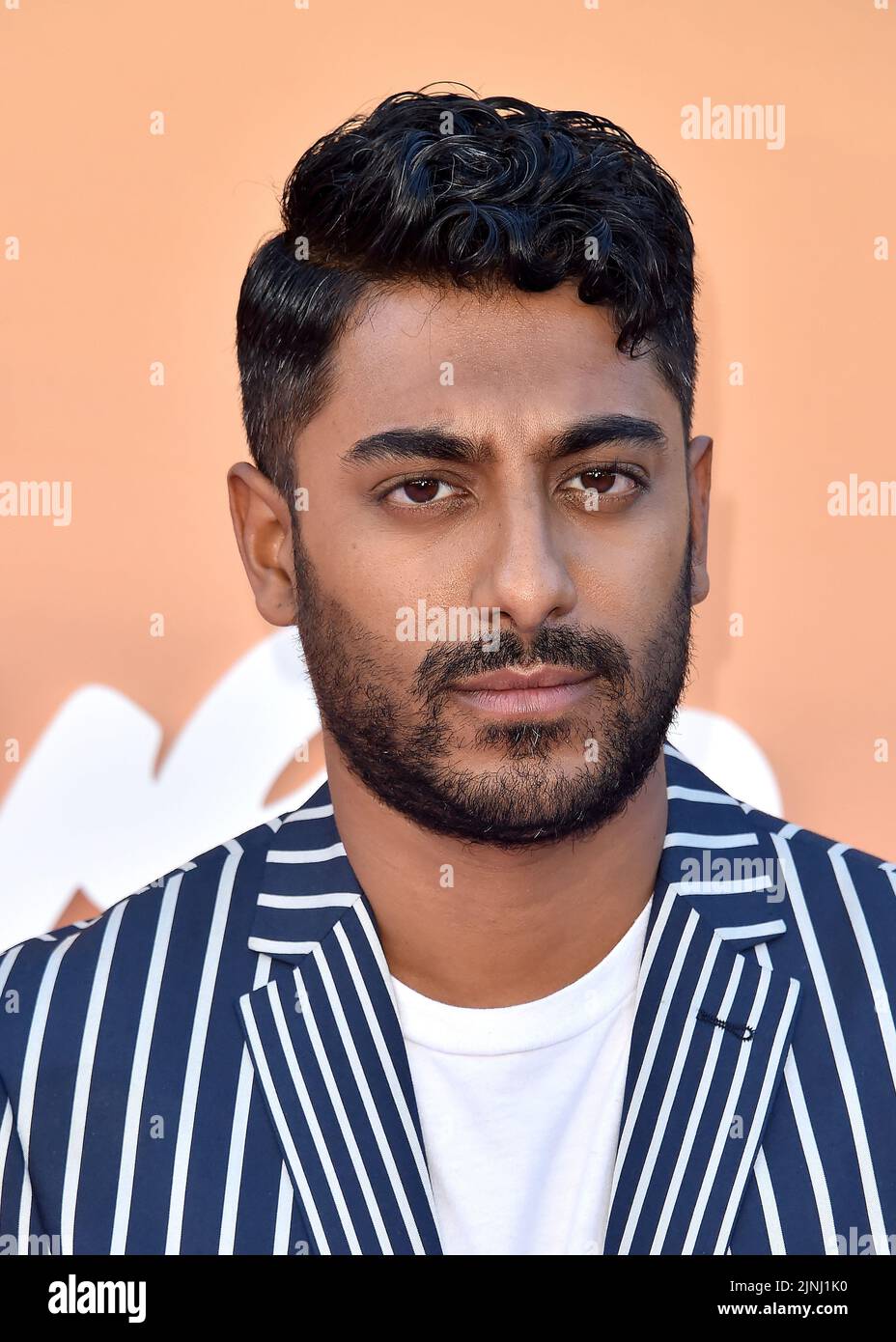 Westwood, USA. 11th Aug, 2022. Ritesh Rajan walking on the red carpet at  the Los Angeles premiere of 