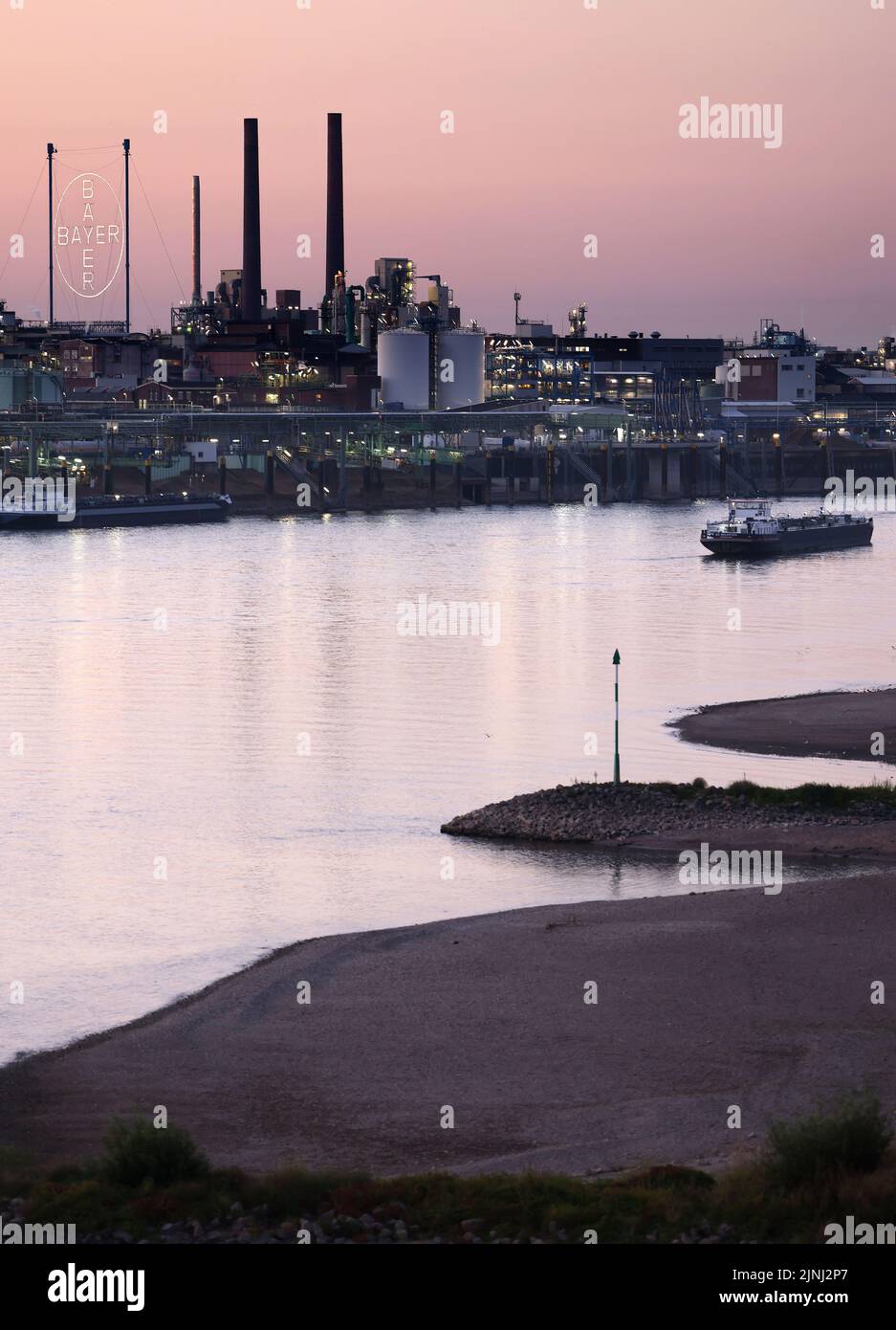 Cologne, Germany. 12th Aug, 2022. A ship is moored on the Rhine in