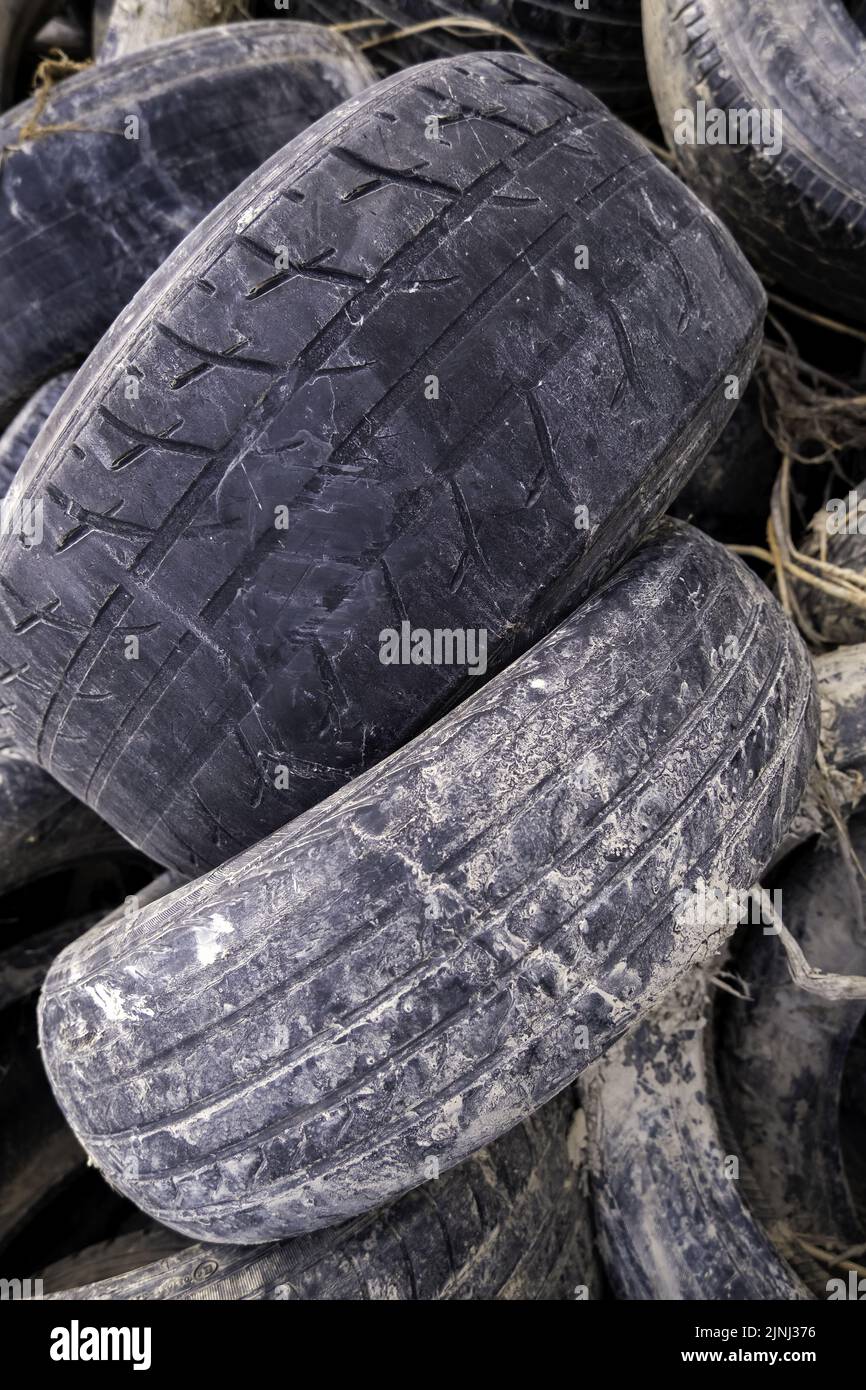 Detail of old car tires, environmental disaster, recycling Stock Photo