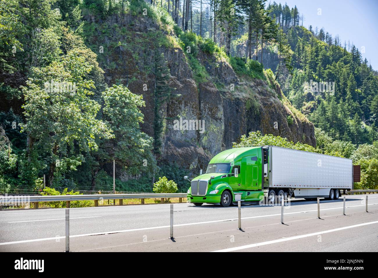 Reefer Big Rig Bright green industrial big rig semi truck with high roof cab ...