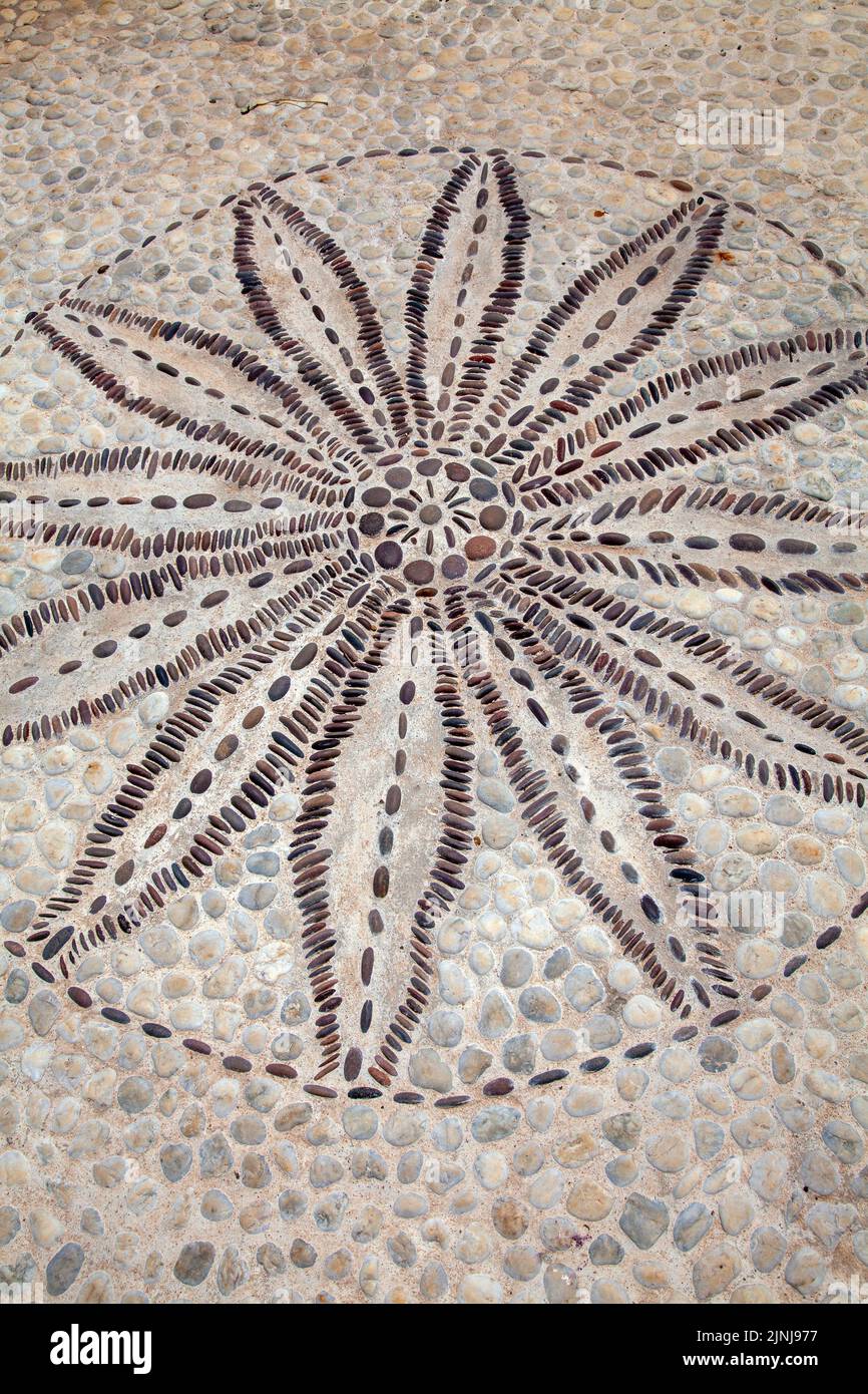 Cycad Design made of Pebbles at Babylonstoren Garden at Simondium in Western Cape, South Africa Stock Photo