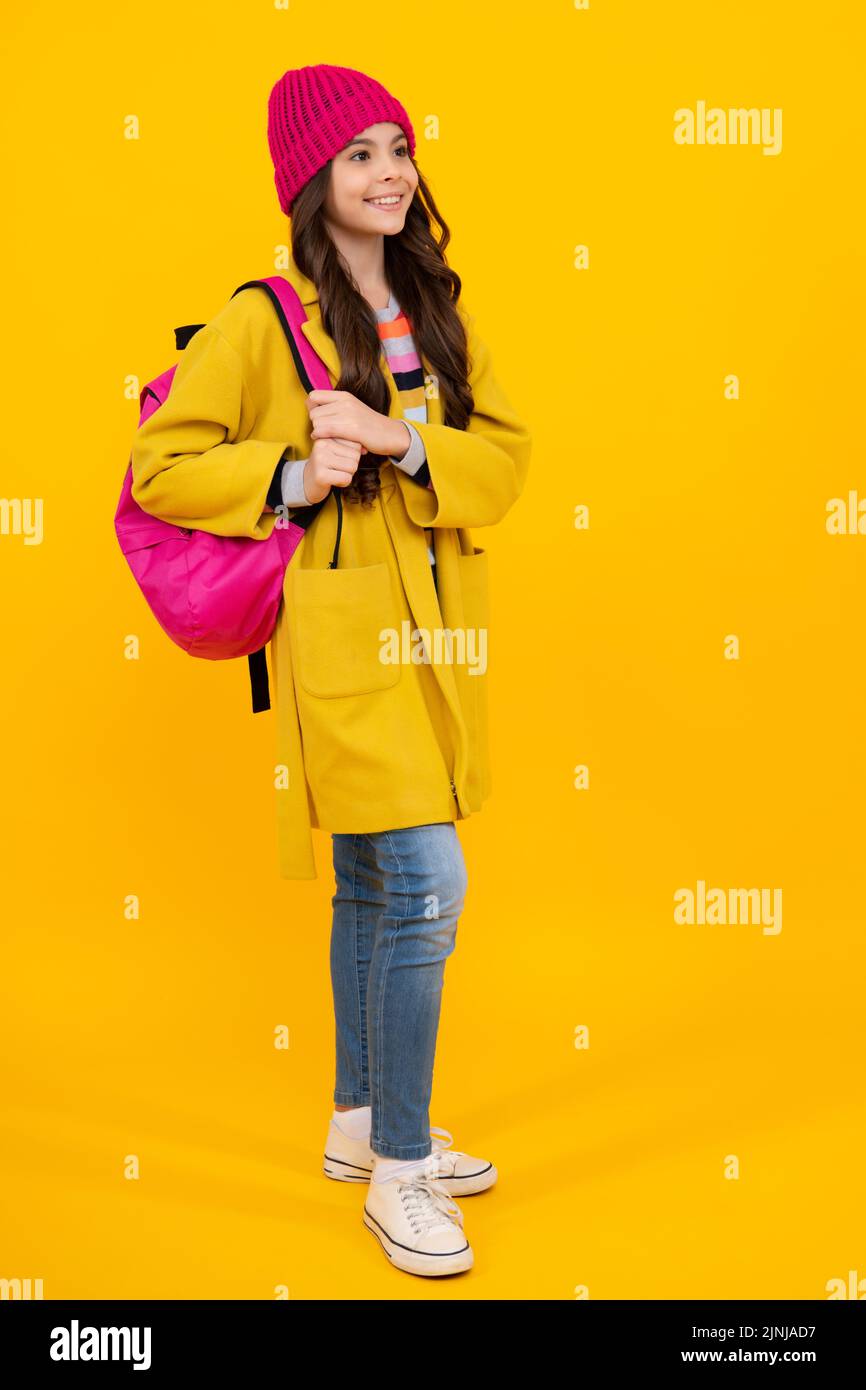 Autumn school. Teenager schoolgirl in school uniform with bag. School ...