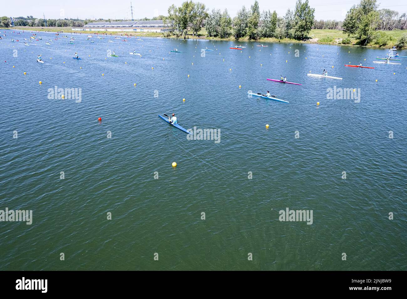 training of rowers on kayaks and canoes on the rowing channel. top view Stock Photo