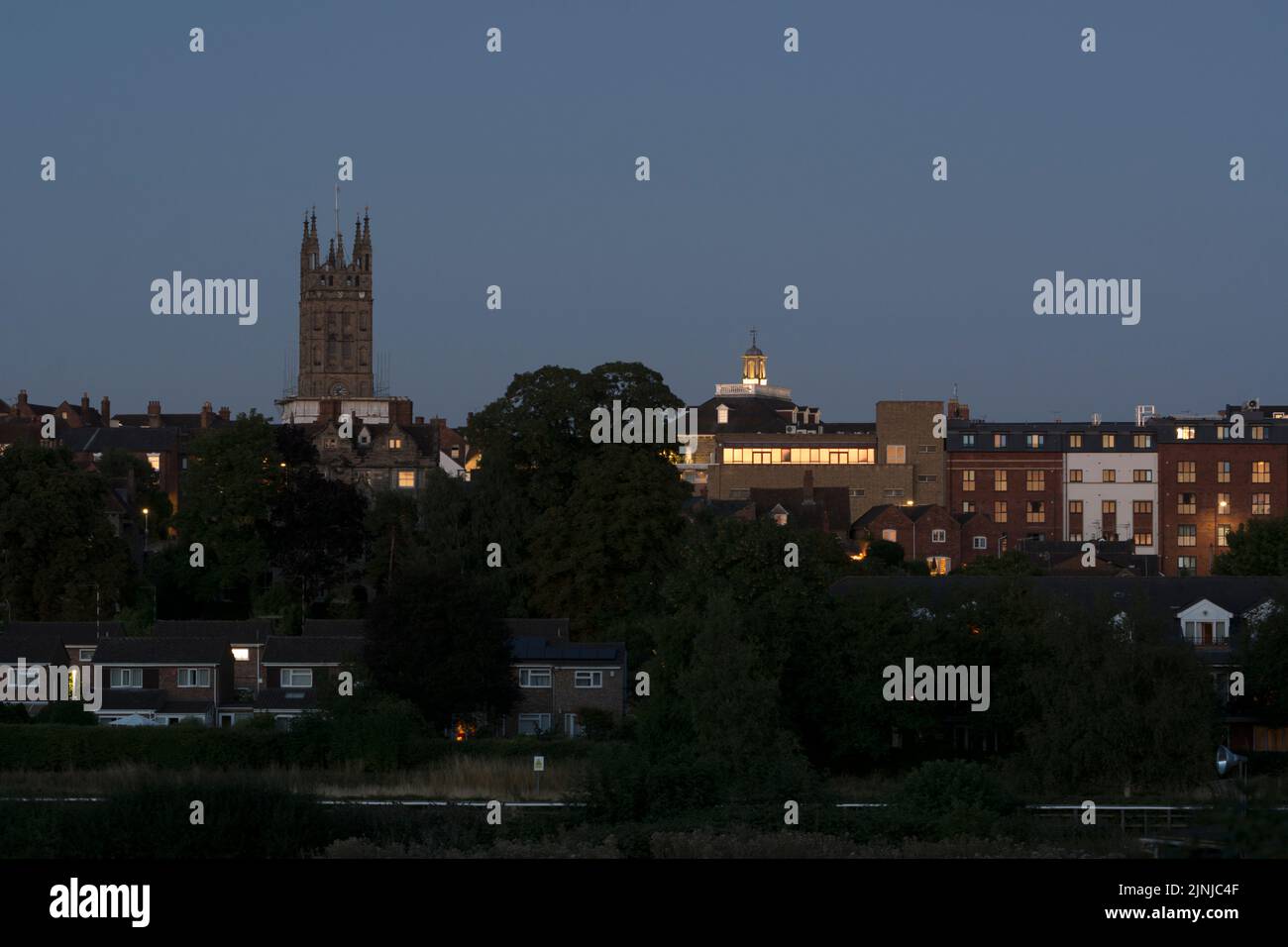 A view of Warwick town centre at dusk in summer, Warwickshire, UK Stock Photo