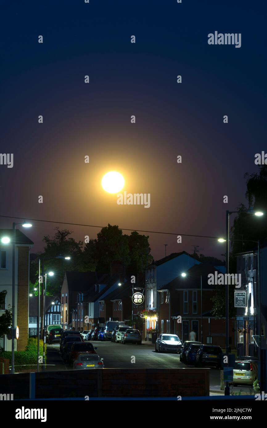A full moon rising over Crompton Street, Warwick, Warwickshire, UK Stock Photo