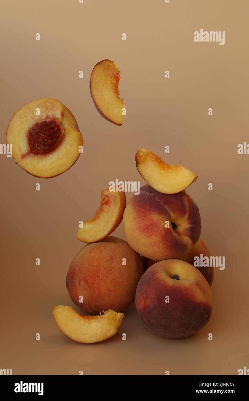 plums on the yellow background with copy space Stock Photo