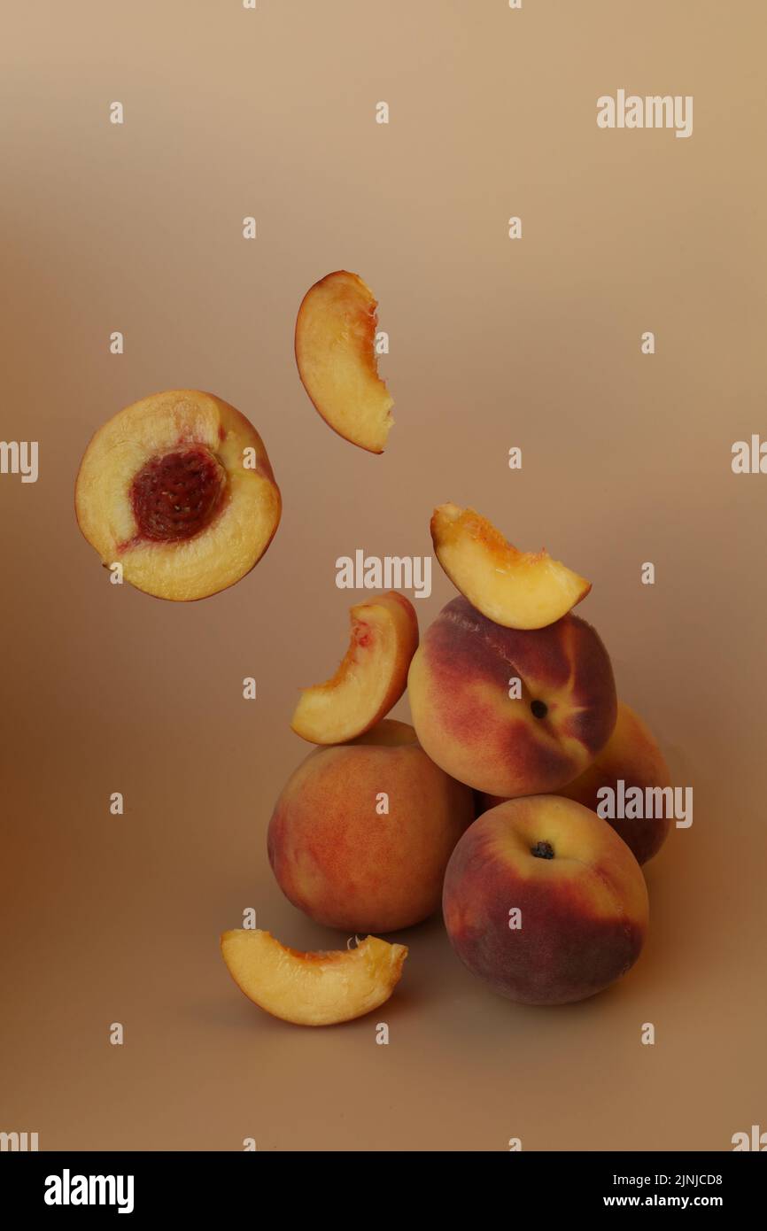 plums on the yellow background with copy space Stock Photo