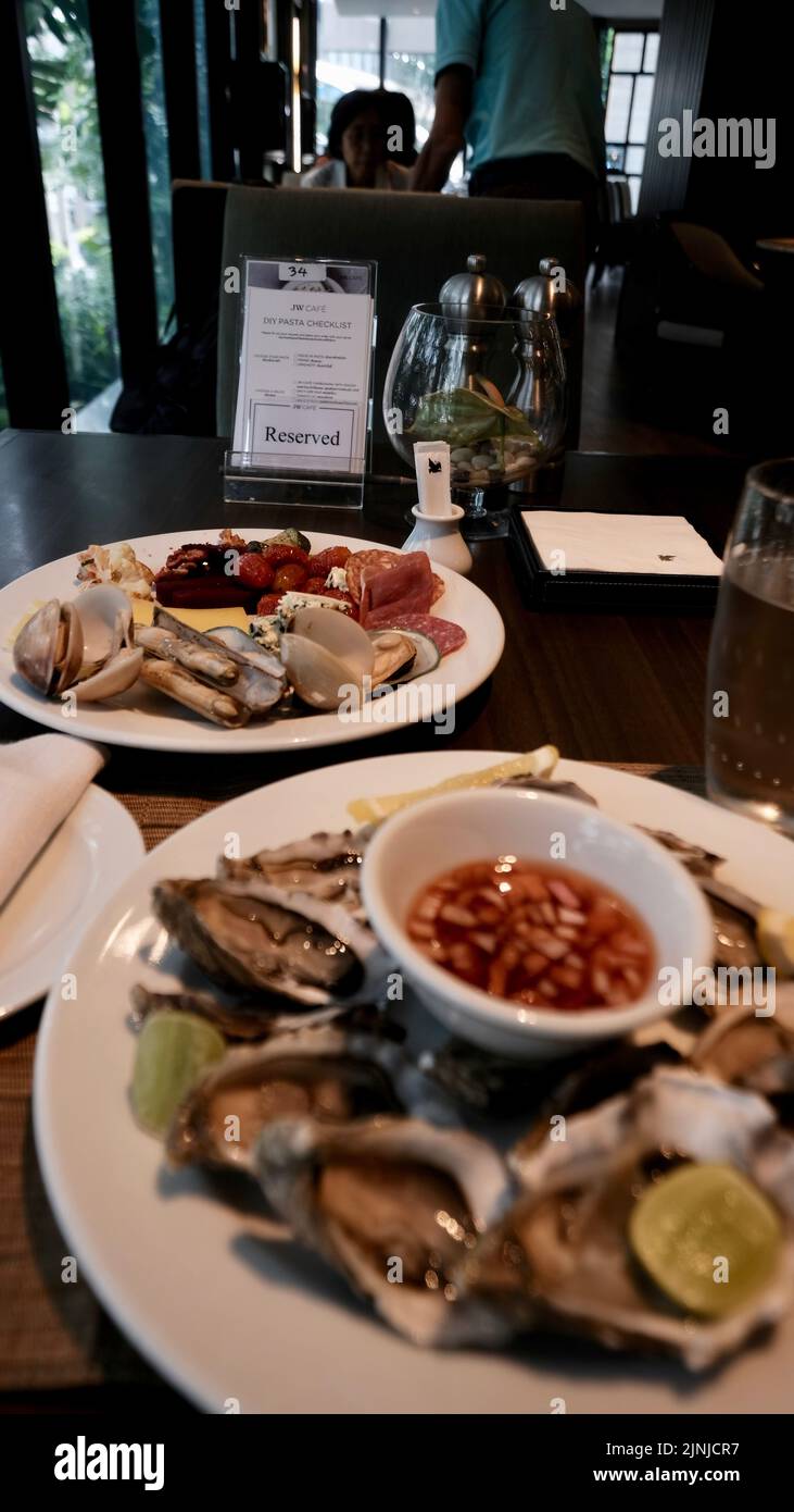 Raw fresh oysters with spicy onion vinaigrette sauce Stock Photo Alamy