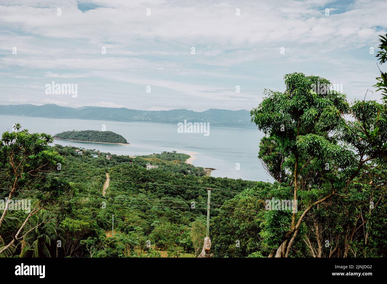 The beautiful view of the green island and sea. Bon Bon Beach, Romblon, Philippines. Stock Photo