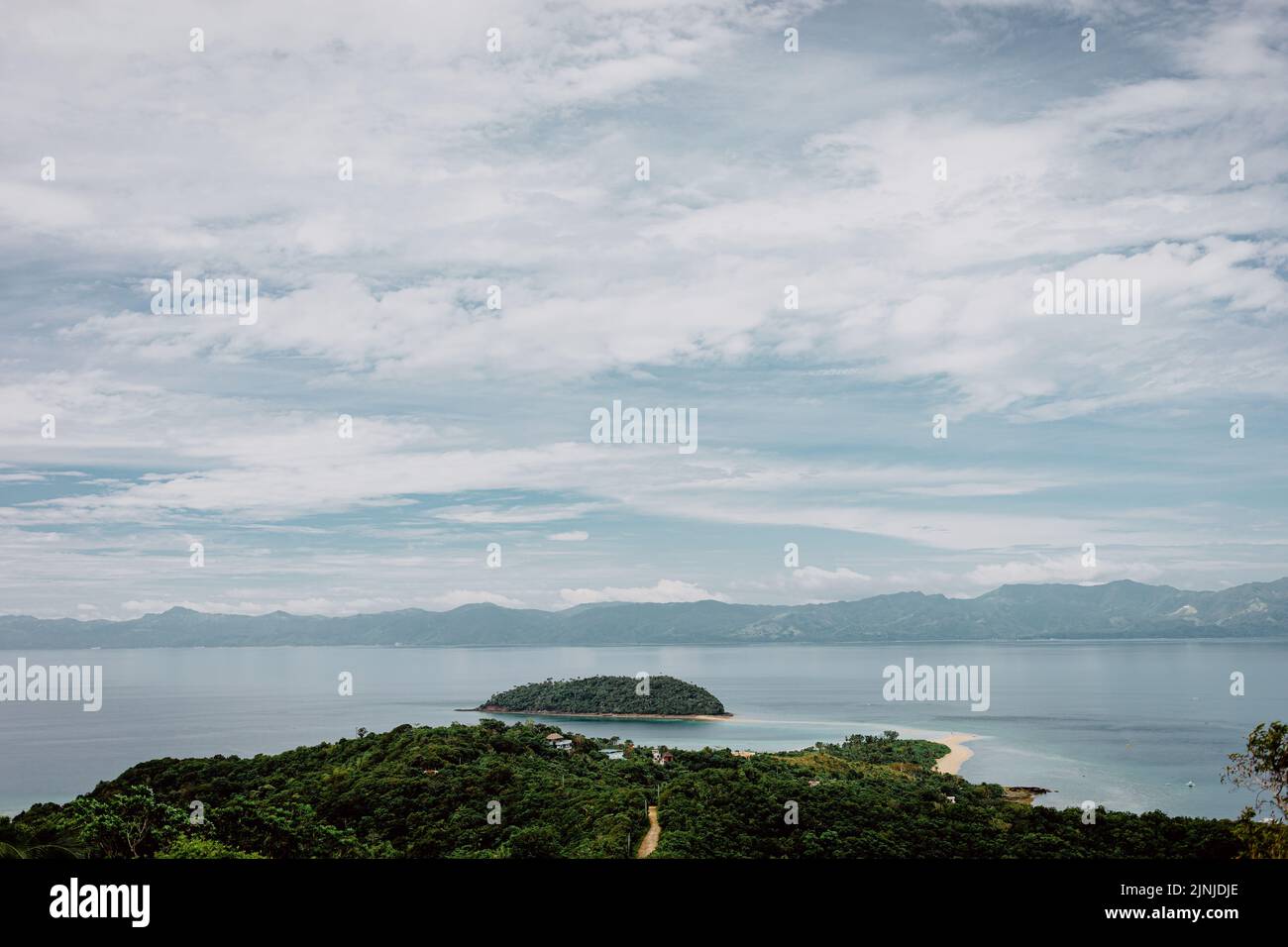 The beautiful view of the green island and sea. Bon Bon Beach, Romblon, Philippines. Stock Photo