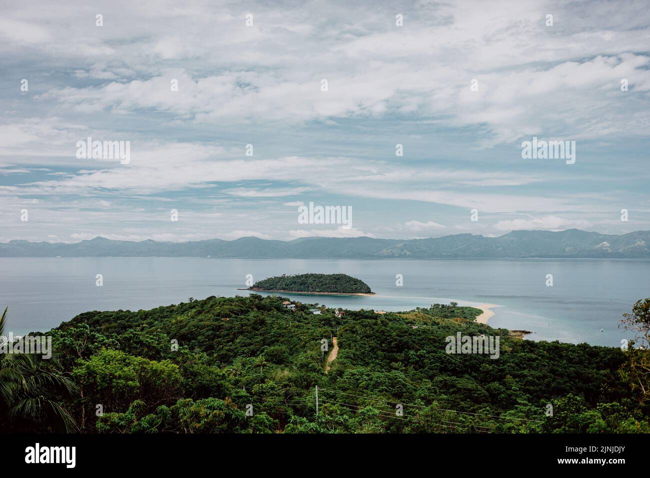 The beautiful view of the green island and sea. Bon Bon Beach, Romblon, Philippines. Stock Photo