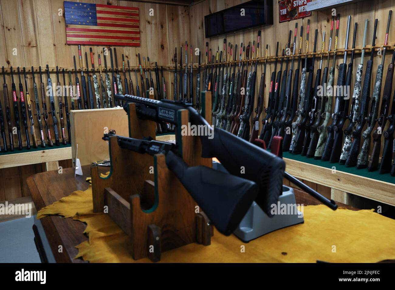 Various types of firearms are seen on display at Calamity Jane's Firearms and Fine Shoes in Hudson Falls, New York, U.S., July 20, 2022. REUTERS/Shannon Stapleton Stock Photo