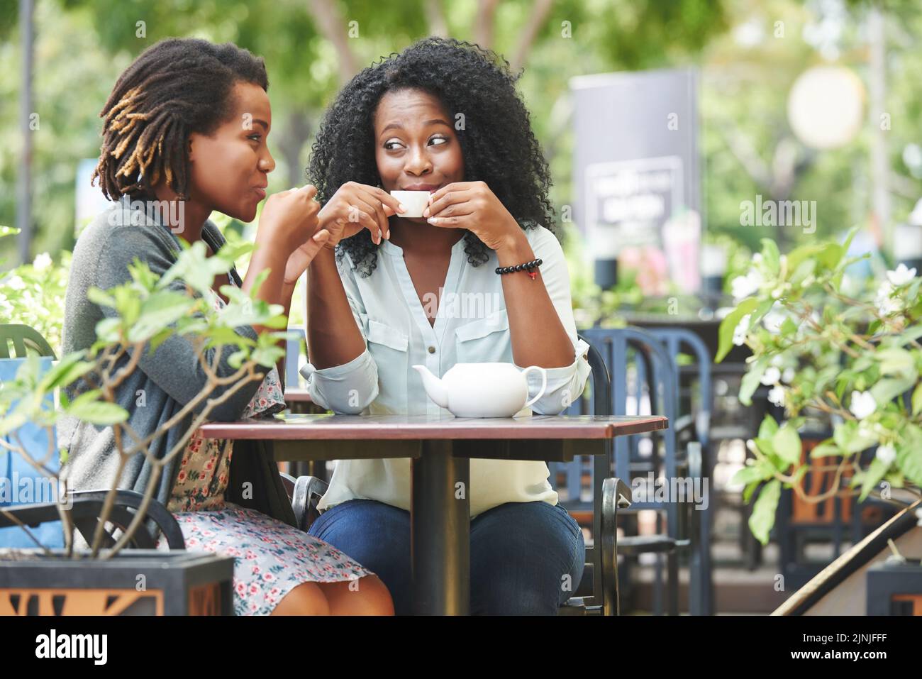 Gossiping and drinking tea hires stock photography and images Alamy