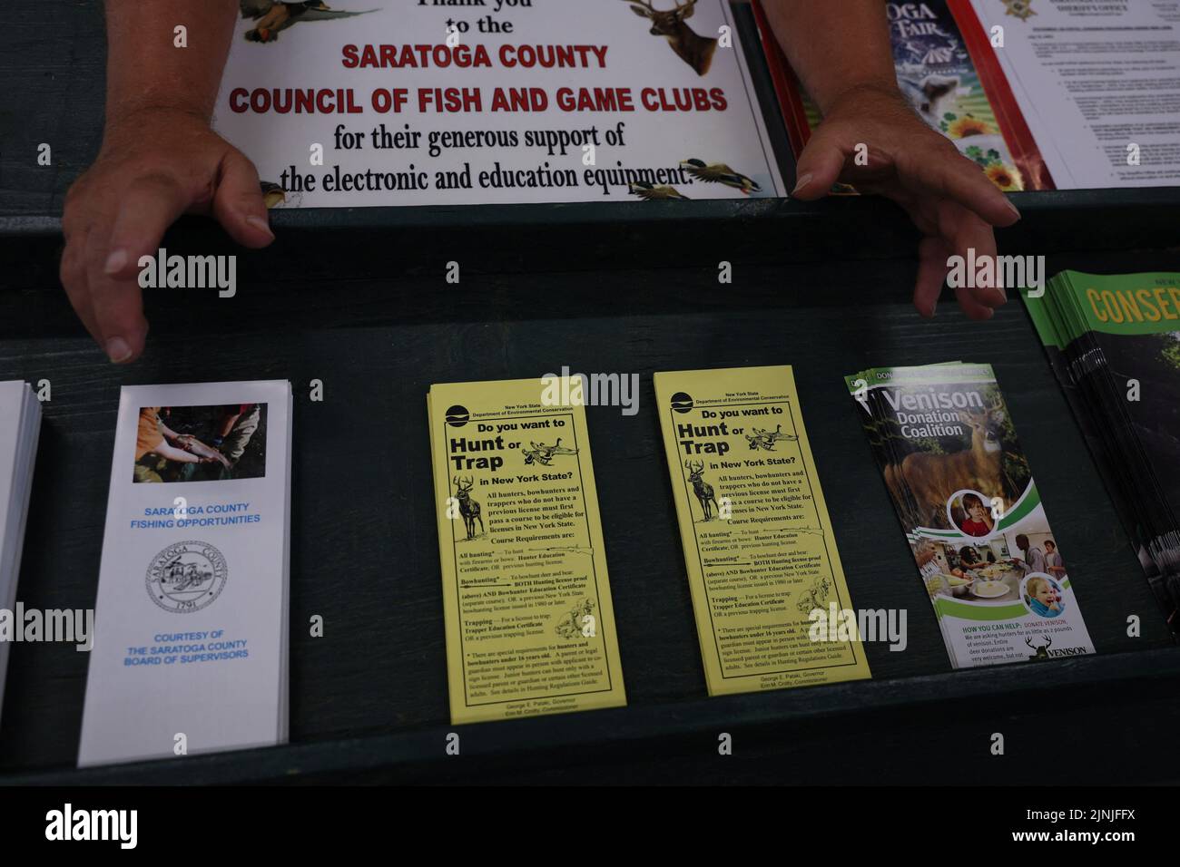 Pamphlets are displayed at the 4-H club booth during the Saratoga County Fair in Ballston Spa, New York, U.S., July 19, 2022. REUTERS/Shannon Stapleton Stock Photo