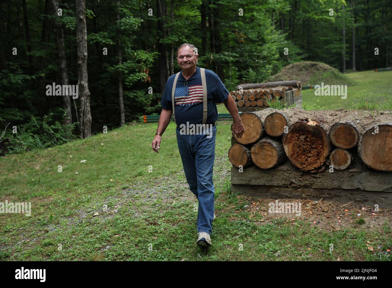 David Porter walks on the grounds of the Lake Luzerne Conservation Rod & Gun Club in Hadley, New York, U.S., July 21, 2022. REUTERS/Shannon Stapleton Stock Photo