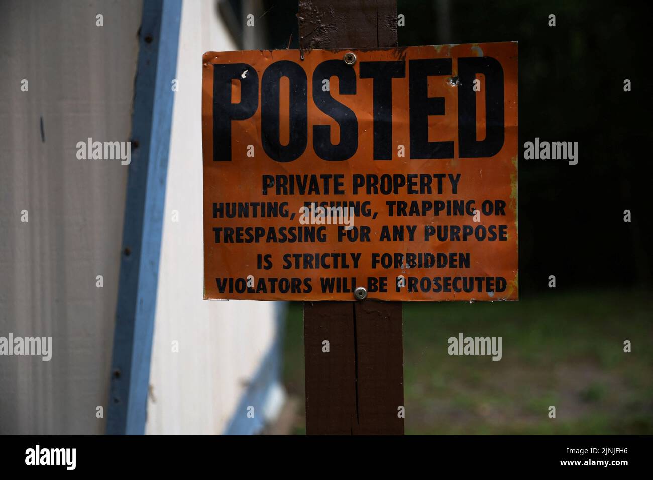 A sign hangs posted on the property of the Lake Luzerne Conservation Rod & Gun Club in Hadley, New York, U.S., July 21, 2022. REUTERS/Shannon Stapleton Stock Photo