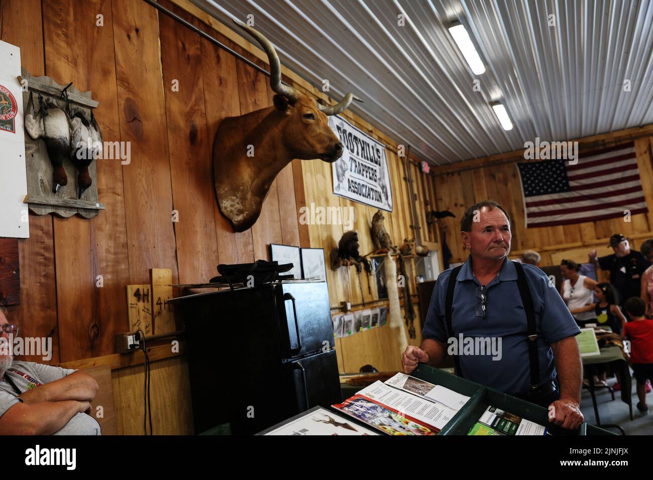 David Porter stands at the 4-H club booth during the Saratoga County Fair in Ballston Spa, New York, U.S., July 19, 2022. REUTERS/Shannon Stapleton Stock Photo