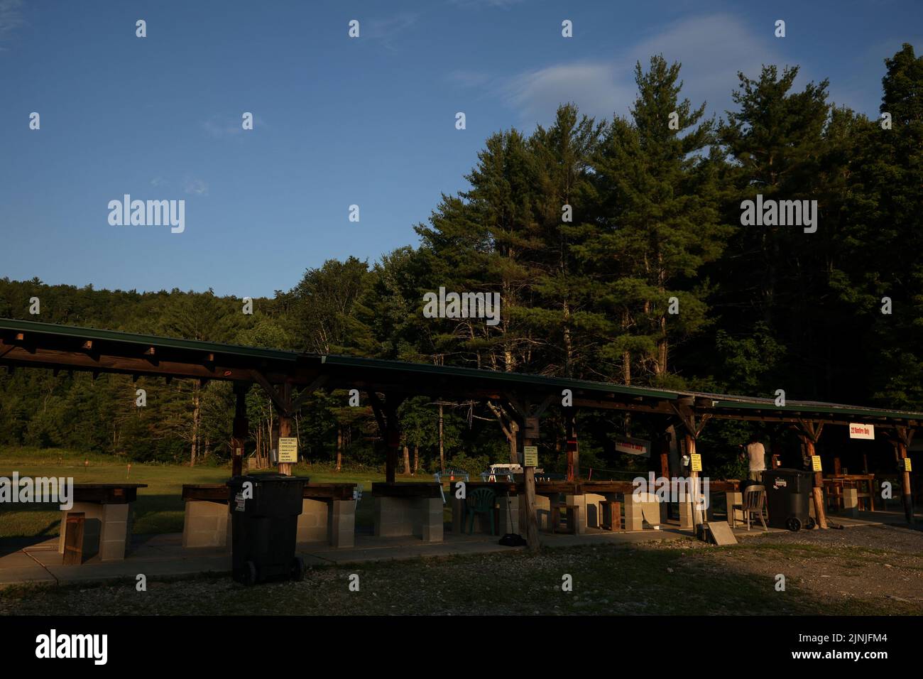 A man shoots target practice with a .22 caliber long rifle at Dunhams Bay Fish & Game Club in Queensbury, New York, U.S., July 20, 2022. REUTERS/Shannon Stapleton Stock Photo