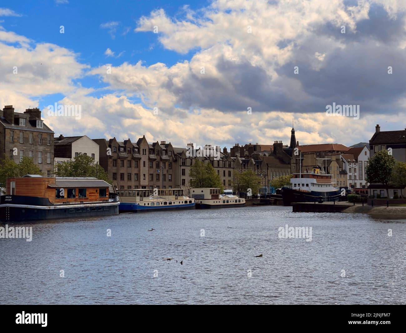 A beautiful shot of barges on water in Leith Port, Edinburgh. The