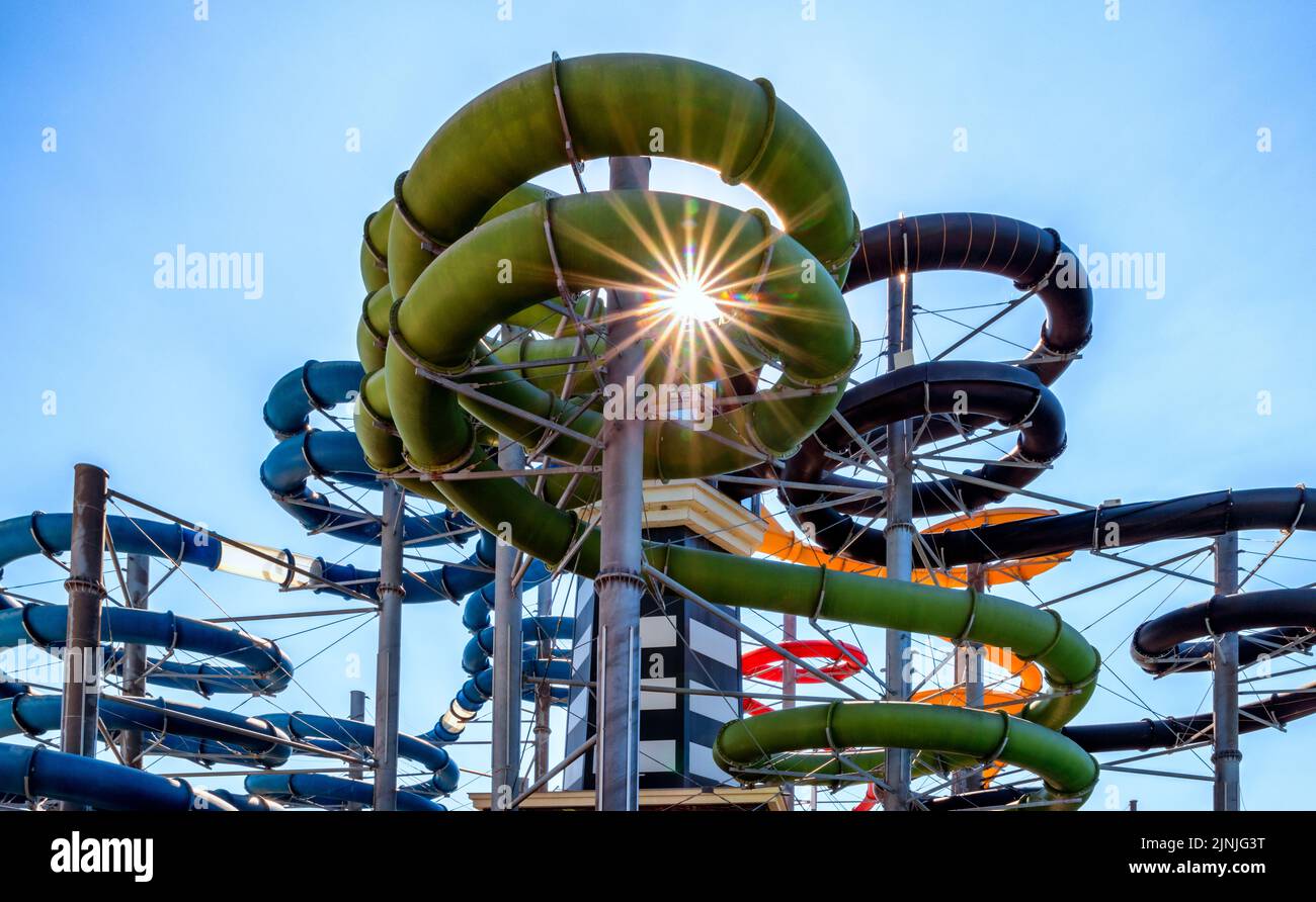 Colorful water slides in aqua park Stock Photo