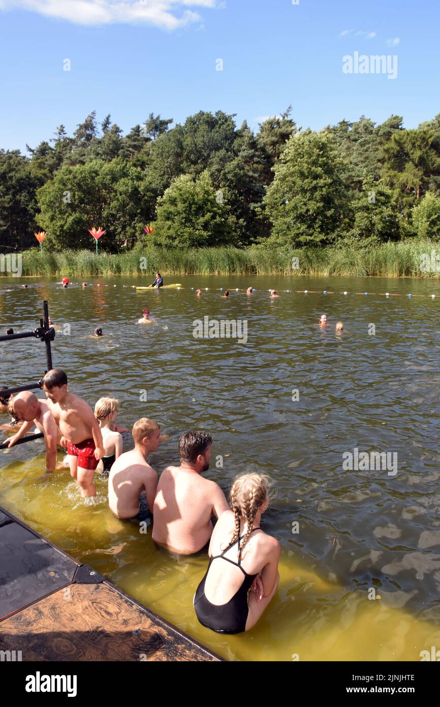 Latitude Festival July 2022, Henham Park, Suffolk, UK. Swimming in the lake Stock Photo
