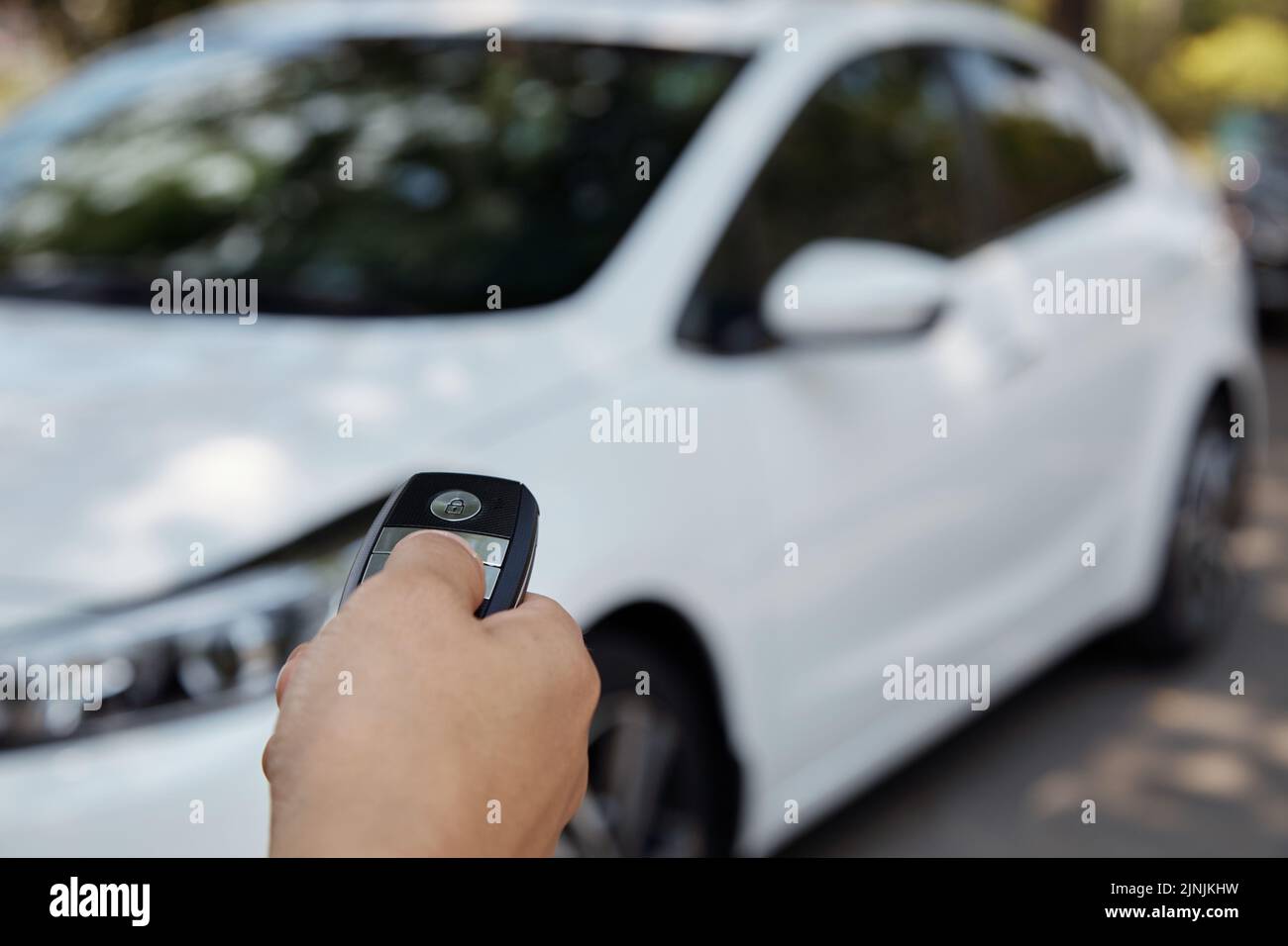 Person using remote control hi-res stock photography and images - Alamy