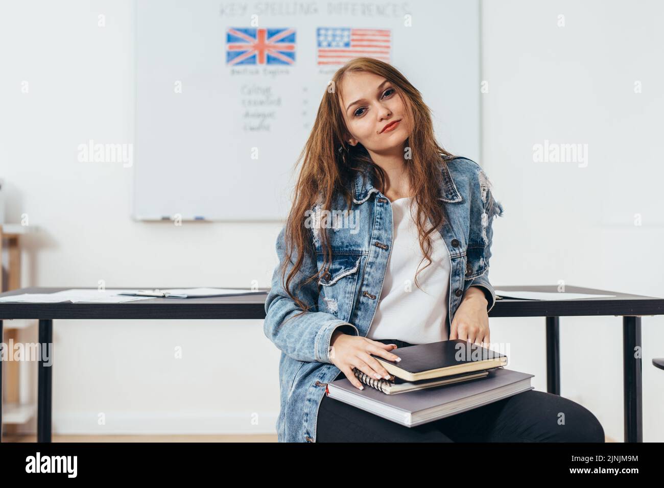 Female student looking at camera. English language school Stock Photo
