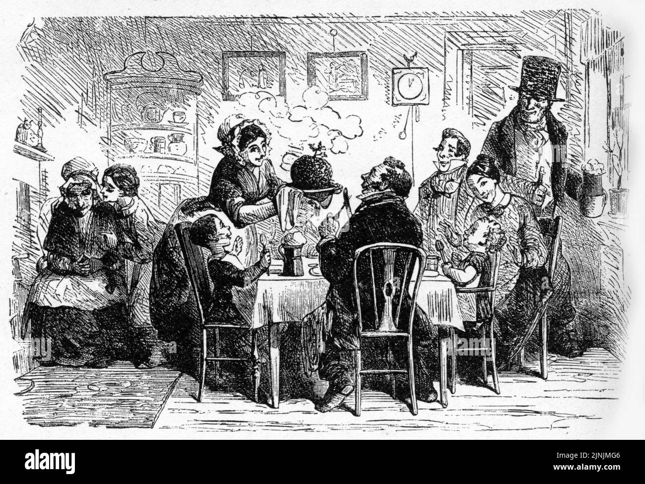 Engraving of a family with christmas dinner, circa 1890, from Charles Dicken's novel A Christmas Carol Stock Photo